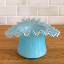 Load image into Gallery viewer, Angled front view of vintage Fenton Art Glass blue opalescent hat dish with crimped edge, 1940s–50s USA