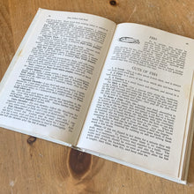Load image into Gallery viewer, This vintage hardcover Blue Ribbon and Pure Gold Cook Book – For Everyday Use in Canadian Homes is a jam-packed collection of recipes using Pure Gold Manufacturing Company products. 158 pages filled with cooking techniques, hundreds of recipes and extensive index. 19th Edition, 1946 and retains one of the four original mail-in coupons at the front of the book. There are six pages of vibrant colour advertisements for Blue Ribbon and Pure Gold products.