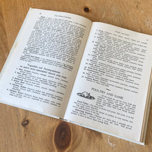 Load image into Gallery viewer, This vintage hardcover Blue Ribbon and Pure Gold Cook Book – For Everyday Use in Canadian Homes is a jam-packed collection of recipes using Pure Gold Manufacturing Company products. 158 pages filled with cooking techniques, hundreds of recipes and extensive index. 19th Edition, 1946 and retains one of the four original mail-in coupons at the front of the book. There are six pages of vibrant colour advertisements for Blue Ribbon and Pure Gold products.