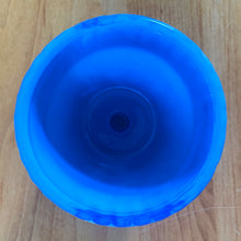 Load image into Gallery viewer, Vintage blue slag glass flower pot with ribbed pan. Produced by Akro Agate, circa 1940s. Use as intended with a small houseplant or succulent, or repurpose as a toothpick holder or upscale your office and use this as a paperclip holder. Best of all this little beauty glows beautifully under black light! In good vintage condition, free from chips/cracks. Marked 300F, Made in the USA. Measures 3 x 2 3/16 inches