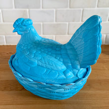 Load image into Gallery viewer, Angled view of vintage blue slag glass hen-on-nest — showing lid and nest basket detail. LG Wright USA 1950s