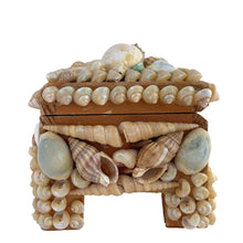 Load image into Gallery viewer, A charming mid-century artisan made trinket box handcrafted in Bremen, Germany, where maritime heritage runs deep despite the city's inland location. This piece exemplifies the golden age of shell art—a beloved souvenir tradition that flourished aboard luxury ocean liners like the SS Bremen and in European coastal gift shops. The wooden base is adorned with genuine shells, creating an authentic tactile surface that captures the romance of vintage travel.