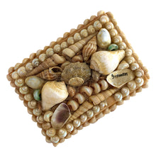 Load image into Gallery viewer, A charming mid-century artisan made trinket box handcrafted in Bremen, Germany, where maritime heritage runs deep despite the city's inland location. This piece exemplifies the golden age of shell art—a beloved souvenir tradition that flourished aboard luxury ocean liners like the SS Bremen and in European coastal gift shops. The wooden base is adorned with genuine shells, creating an authentic tactile surface that captures the romance of vintage travel.