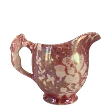 Load image into Gallery viewer, Beautiful vintage mid-century "Brocade Cranberry" iridescent bone china creamer featuring a rosebud handle, rimmed in gold gilt. Crafted by Royal Winton Grimwades, England, between 1934 - 1950. A stunning example of Chintz and cottage style! In excellent vintage condition, free from chips/cracks/repairs, normal crazing. Creamer measures 2 1/2 x 3 1/2 inches