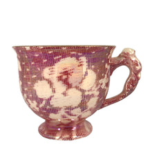 Load image into Gallery viewer, Beautiful vintage mid-century "Brocade Cranberry" iridescent bone china teacup, featuring a rosebud handle and rim trimmed in gold gilt. Crafted by Royal Winton Grimwades, England, between 1934 - 1950. A stunning example of Chintz and cottage style! Free from chips/cracks/repairs. Measures 3 1/4 x 2 3/4 inches