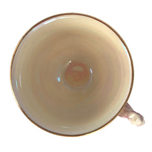 Load image into Gallery viewer, Beautiful vintage mid-century "Brocade Cranberry" iridescent bone china teacup, featuring a rosebud handle and rim trimmed in gold gilt. Crafted by Royal Winton Grimwades, England, between 1934 - 1950. A stunning example of Chintz and cottage style! Free from chips/cracks/repairs. Measures 3 1/4 x 2 3/4 inches