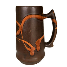 Load image into Gallery viewer, Side view of vintage brown with amber swirls glazed stoneware stein or mug. Crafted by Laurentian Pottery, Canada, 1970s