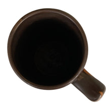 Load image into Gallery viewer, Overhead view of vintage brown with amber swirls glazed stoneware stein or mug. Crafted by Laurentian Pottery, Canada, 1970s
