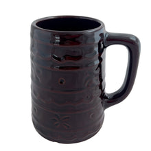 Load image into Gallery viewer, Vintage Daisy and Dots old fashioned stoneware beer stein or mug featuring a deep brown glaze decorated with a Pennsylvania Dutch pattern of daisy, dots, on bands with scalloped design and smooth rim. A lovely early American farmhouse themed mug, perfect for enjoying your favourite beer or beverage.
In excellent condition, no chips/cracks/repairs.
Measures 4 1/2 x 3 3/4 x 5 1/8 inches (incl. handle)
Capacity 16 ounces