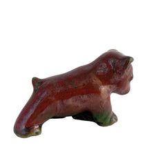 Load image into Gallery viewer, This exquisite vintage bear cub stoneware figurine is a beautiful example of mid-century Danish pottery, designed by Gertrud Kudielka for Lauritz Hjorth during the golden era of Scandinavian design (1940s–1960s). Featuring a rich mottled glaze in earthy browns and forest greens with a luminous finish, its walking pose adds charm and movement. A perfect piece for collectors of vintage animal sculptures or lovers of nature-inspired décor with authentic European craftsmanship.