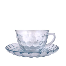 Load image into Gallery viewer, Vintage depression era "Bubble Blue" pressed glass cup and saucer set. Crafted by Anchor Hocking, USA, between 1942 - 1948. Sip a nice hot cup of tea or coffee from this classic glassware! In excellent condition, free from chips. Cup measures 3 3/4 x 2 1/4 inches Saucer measures 5 5/8 inches