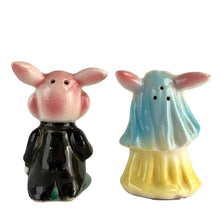 Load image into Gallery viewer, Vintage hand painted anthropomorphic rabbit bride and groom salt and pepper shakers. PY, Japan, 1950s. Add these adorable kitschy shakers to your collection or give as a wedding gift!
In as found vintage condition, bridge bunny has a chip to the tip of the ear, no cracks/repairs. Marked, Japan.
Measures 2 1/4 x 1 3/4 x 3 1/8 inches