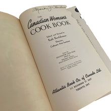 Load image into Gallery viewer, Vintage The Canadian Woman's Cookbook, hardcover book. Its 815 pages are jam-packed with a variety of recipes and practical information, colour and black & white photos throughout. Edited by Ruth Berolzheimer who was the Director of Culinary Arts Institute in Toronto. Published in 1939 by the Atlantis Book Co., Canada. A superior reference book for the culinary enthusiast or anyone who wants a well-rounded cookbook to add to their collection!