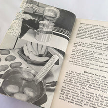 Load image into Gallery viewer, Vintage The Canadian Woman's Cookbook, hardcover book. Its 815 pages are jam-packed with a variety of recipes and practical information, colour and black & white photos throughout. Edited by Ruth Berolzheimer who was the Director of Culinary Arts Institute in Toronto. Published in 1939 by the Atlantis Book Co., Canada. A superior reference book for the culinary enthusiast or anyone who wants a well-rounded cookbook to add to their collection!
