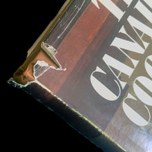 Load image into Gallery viewer, Vintage The Canadiana Cookbook, hardcover cookbook "a complete heritage of Canadian cooking" with recipes organized by province. Written by Mme. Jehane Benoit, renowned Canadian culinary author, speaker, commentator, journalist and broadcaster during the 50s/60s/70s. Its 203 pages of regional recipes and line illustrations. Published by Pagurian Press, Canada, 1970, first edition. The bound book is in excellent condition showing normal age-related page yellowing and the jacket cover has wear and is torn.