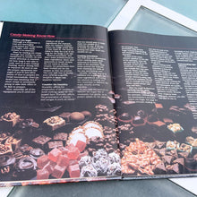 Load image into Gallery viewer, Better Homes and Gardens is known for its fabulous cookbooks. This hardcover cookbook focuses on candy recipes and designs. Its 96 pages are filled with amazing recipes along with many colour photographs. Originally published by Meredith Corporation, USA, 1984. This is the first edition. In great vintage condition with normal age-related yellowing.
