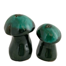 Load image into Gallery viewer, Canuck Pottery Evangeline green drip glaze salt and pepper shakers standing upright, showing shaker holes on teal glazed mushroom caps