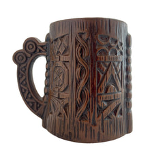 Load image into Gallery viewer, Groovy collectible vintage caramel brown handled tiki mug. Crafted by Orchids of Hawaii, Japan, 1950s. The perfect tropical addition to your retro drinkware collection!
In good vintage condition, no chips. Marked Orchids of Hawaii Japan
Measures 4 1/2 x 3 x 4 inches (incl. handle)