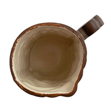 Load image into Gallery viewer, Groovy collectible vintage caramel brown handled tiki mug. Crafted by Orchids of Hawaii, Japan, 1950s. The perfect tropical addition to your retro drinkware collection!
In good vintage condition, no chips. Marked Orchids of Hawaii Japan
Measures 4 1/2 x 3 x 4 inches (incl. handle)