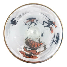 Load image into Gallery viewer, Overhead view of 22kt gold enamel rim detail on vintage Libbey Caribbean Cruise pilsner glass, USA 1959–1962
