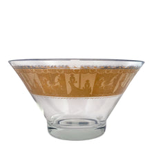 Load image into Gallery viewer, Fabulous vintage mid-century modern Carousel punch bowl with ten matching roly poly glasses and gold toned metal ladle. The glassware is decorated with carousel horses and carriages in 22kt gold on teal blue paint. Crafted by Colony, USA, circa 1960s. Perfect for serving eggnog, alcohol or non-alcohol punch at your next soirée! Stunning doesn't quite describe this fabulous set which is sure to be a standout at your next party!