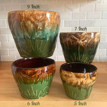 Load image into Gallery viewer, Vintage mid-century Celestial Moon and Star ceramic stoneware garden planter with embossed starburst suns and moons in brown ochre green drip glaze. Robinson Ransbottom Pottery Co., USA, 1960s. This highly collectible garden planter will look gorgeous filled with your favourite greenery or flowers.
In excellent vintage condition, minor age-related wear and crazing, no chips/cracks. See photos for maker's marks. Sizes: 5, 6, 7 and 9 inches