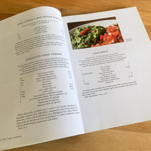 Load image into Gallery viewer, Chez Piggy is a beloved restaurant and bakery in Kingston Ontario Canada. This softcover cookbook contains 239 pages filled with wonderful recipes along with many colour photographs. Published by Firefly Books. Canada, 1988. This is the forth edition 2006. In great vintage condition with normal age-related yellowing.