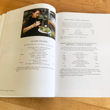 Load image into Gallery viewer, Chez Piggy is a beloved restaurant and bakery in Kingston Ontario Canada. This softcover cookbook contains 239 pages filled with wonderful recipes along with many colour photographs. Published by Firefly Books. Canada, 1988. This is the forth edition 2006. In great vintage condition with normal age-related yellowing.