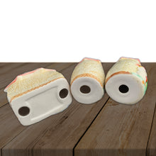 Load image into Gallery viewer, Darling vintage set of salt and pepper shakers with napkin holder featuring a sweet little chick and sunflower under an umbrella on a textured wheat coloured ground. Crafted by UCAGO, Japan, circa 1950s. Dress up your kitchen collectibles with this sweet decorative and useful tableware set. In excellent used condition. Unmarked. Shakers measure 2 x 3 1/4 inches Napkin holder measures 3 1/4 x 2 1/8 x 3 1/4 inches