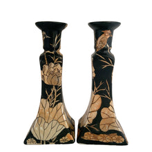 Load image into Gallery viewer, Vintage Chinoiserie style porcelain candle holders decorated in black with peach lustre lily flowers and birds. Crafted in Japan, 1960s. A beautiful complement to any decor style.
In good vintage condition, no chips. Unmarked.
Measures 3 7/8 x 3 7/8 x 8 7/8