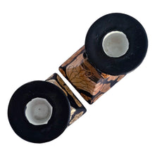 Load image into Gallery viewer, Vintage Chinoiserie style porcelain candle holders decorated in black with peach lustre lily flowers and birds. Crafted in Japan, 1960s. A beautiful complement to any decor style.
In good vintage condition, no chips. Unmarked.
Measures 3 7/8 x 3 7/8 x 8 7/8