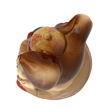Load image into Gallery viewer, Adorable vintage, mid-century era anthropomorphic chipmunk ceramic cookie jar. Crafted by Royal Sealy, Japan, 1950s. A delightful addition to your cookie jar collection and kitchen decor!
In great vintage condition with wear to the cold paint, no chips, normal crazing commensurate with age. A crazing line extends to the unglazed portion of the lid and there is an X crazing mark on the bottom, neither goes through to the other side.
Measures 6 1/4 x 6 3/4 x 12 1/2 inches