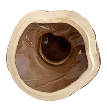 Load image into Gallery viewer, Adorable vintage, mid-century era anthropomorphic chipmunk ceramic cookie jar. Crafted by Royal Sealy, Japan, 1950s. A delightful addition to your cookie jar collection and kitchen decor!
In great vintage condition with wear to the cold paint, no chips, normal crazing commensurate with age. A crazing line extends to the unglazed portion of the lid and there is an X crazing mark on the bottom, neither goes through to the other side.
Measures 6 1/4 x 6 3/4 x 12 1/2 inches