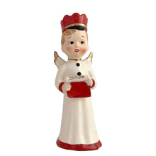 Load image into Gallery viewer, Vintage mid-century beautifully hand painted ceramic Christmas angel figurines. One, a choir boy with music song sheet and red hat and one a blonde haired girl holding a black lyre harp. Both angels wear robes of white with red trim and gold tipped wings. Made in, Japan, 1950s. These highly collectible figurines are the perfect accent for your Christmas holiday display!
Both angels are in excellent vintage condition with minor paint loss, no chips/cracks/repairs.