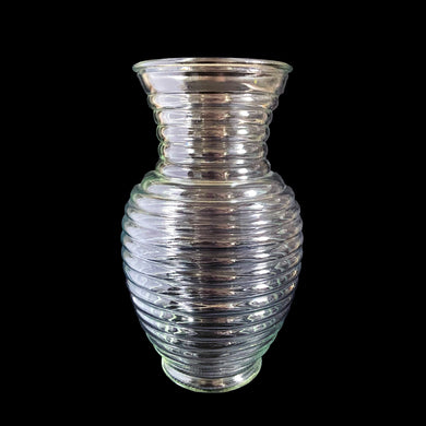 This large vintage clear pressed glass Circle vase featuring a concentric ribbed beehive pattern. Crafted by Anchor Hocking , USA. Perfect for gifting filled a beautiful floral arrangement or as a standalone vessel! In excellent condition, free from chips. Measures 6 1/2 x 10 3/4 inches