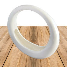 Load image into Gallery viewer, Vintage retro art deco style circular ceramic planter finished in glossy white glaze and felted bottom. Crafted by Sedan Manufacturing, Canada, circa 1980s. Nestle in a few of your favourite plants or succulents to create a lovely container garden or put together a sweet holiday display with bottle brush Christmas trees and ornaments.