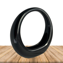 Load image into Gallery viewer, Vintage retro art deco style circular ceramic planter finished in glossy black or white glaze and felted bottom. Crafted by Sedan Manufacturing, Canada, circa 1980s. Nestle in a few of your favourite plants or succulents to create a lovely little container garden or put together a sweet holiday display with bottle brush Christmas trees and ornaments.