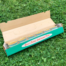 Load image into Gallery viewer, Retro insect control hits your patio with these vintage citronella candles in aluminum foil tins that sit comfortably in individual metal stands. Manufactured by F. Baillargeon Ltd., Canada, circa 1950s. This Montreal based company has been producing candles since 1896! New in box with six candles and six holders, plus instructions for use.