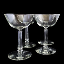 Load image into Gallery viewer, These vintage mid-century 3002 clear champagne or tall sherbet glasses feature a stem that replicates a delicate grecian style column. Crafted by Libbey Glass, USA, 1950s. This stemware will add a touch of Hollywood glam to any occasion. You bar cart will thank you...cheers! In excellent condition, no chips. Measures 3 3/4 x 5 1/2 inches Capacity 6 ounces