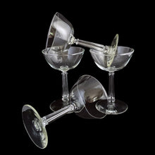 Load image into Gallery viewer, These vintage mid-century 3002 clear champagne or tall sherbet glasses feature a stem that replicates a delicate grecian style column. Crafted by Libbey Glass, USA, 1950s. This stemware will add a touch of Hollywood glam to any occasion. You bar cart will thank you...cheers! In excellent condition, no chips. Measures 3 3/4 x 5 1/2 inches Capacity 6 ounces
