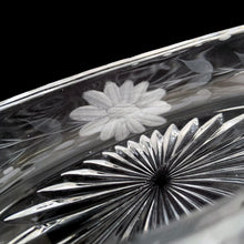 Load image into Gallery viewer, Macro close-up of vintage cut glass canoe bonbon dish interior — finely wheel-engraved daisy with detailed petal linework alongside deep starburst fan cut