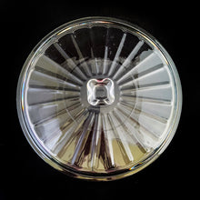 Load image into Gallery viewer, This large vintage clear glass lidded casserole dish has a distinctive scalloped design that makes cooking and serving effortless. It is oven, microwave, and dishwasher safe, making it easy to transport and reheat your favorite dishes with minimal mess. Crafted by Anchor Hocking, USA, circa 1950s, this dish is sure to bring style and convenience to your kitchen. In excellent condition, free from chips. Measures 9 inches / 23 cm Capacity 2 quarts/litres