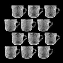 Load image into Gallery viewer, Vintage clear Soreno pressed glass punch bowl and 12 matching cups featuring a textured bark surface. Crafted by Anchor Hocking, USA, 1966 - 1970. Perfect for serving your favourite concocted beverages.
All in excellent condition, no chips.
Bowl measures 12 3/4 x 6 inches
Cups measure 3 x 2 5/8 inches