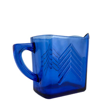 Load image into Gallery viewer, Classic vintage cobalt blue Chevron pressed glass creamer. Crafted by Hazel-Atlas Glass, USA, 1930s. Made in two sizes, this is the larger version. A stunning example of art deco tableware!
In excellent condition, no chips.
Measures 5 7/8 x 2 1/2 x 4 1/4 inches
Capacity 14 ounces
