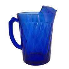 Load image into Gallery viewer, Vintage cobalt blue "Diamond Optic" glass beverage pitcher. Crafted by Hazel-Atlas Glass, USA, circa 1930s. A great addition to your bar and glassware collection! In excellent condition, free from chips. Marked on the bottom. Measures 5 1/2 x 8 inches Capacity 54 ounces