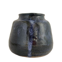 Load image into Gallery viewer, Vintage cobalt blue drip glazed hand thrown redware pottery vase. Signed by the artist. A lovely decor piece that would be beautiful with a fresh or dry bouquet.
In excellent condition, no chips/cracks/repairs. There are glaze pops and a glaze miss on the interior below the rim.
Measures 5 7/8 x 5 1/8 inches