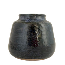 Load image into Gallery viewer, Vintage cobalt blue drip glazed hand thrown redware pottery vase. Signed by the artist. A lovely decor piece that would be beautiful with a fresh or dry bouquet.
In excellent condition, no chips/cracks/repairs. There are glaze pops and a glaze miss on the interior below the rim.
Measures 5 7/8 x 5 1/8 inches