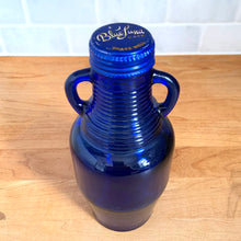Load image into Gallery viewer, Three-quarter angle view of cobalt blue Luna Café bottle, Madera Glass Co. USA 1998