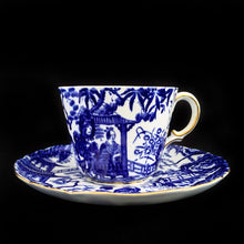 Load image into Gallery viewer, Classic "Mikado" flat cup and saucer with asian themed design in cobalt blue on white bone china with gold gilt rim. Craft by Royal Crown Derby, England, circa 1940s. In excellent condition, free from chips/cracks. Teacup measures 3 x 2 3/8 inches | Saucer measures 5 1/2 inches