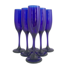 Load image into Gallery viewer, Set of six vintage Libbey Premiere Cobalt blue champagne flutes arranged on a table.